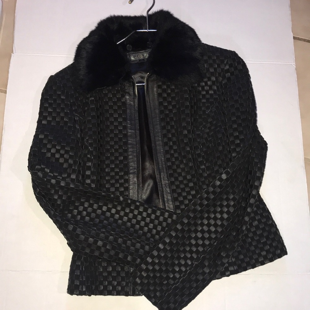 Wilson’s black leather jacket new